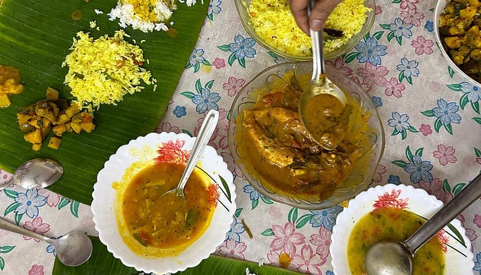 Munni teaching cooking techniques